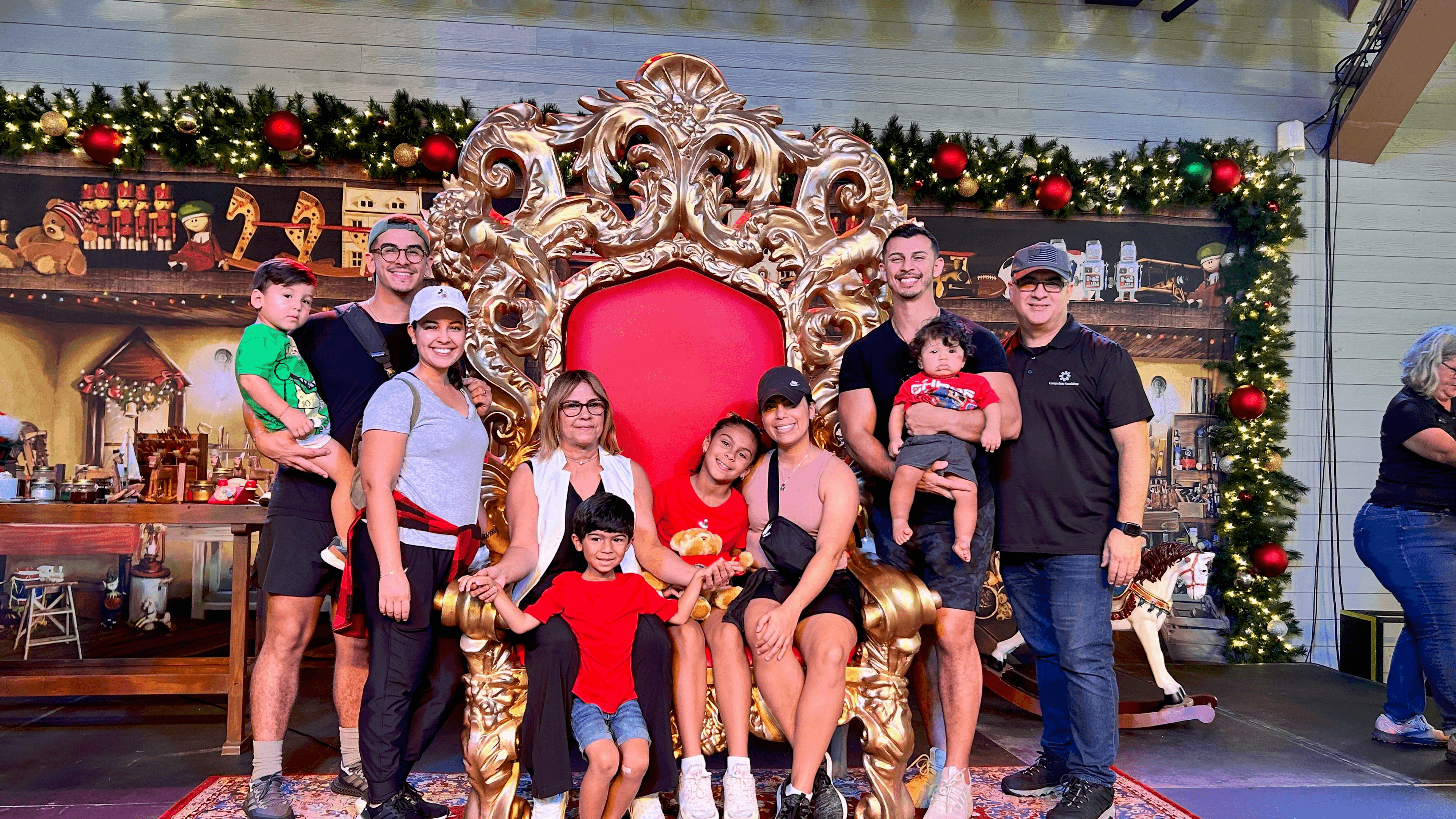 Gonzalez family smiling together in their home